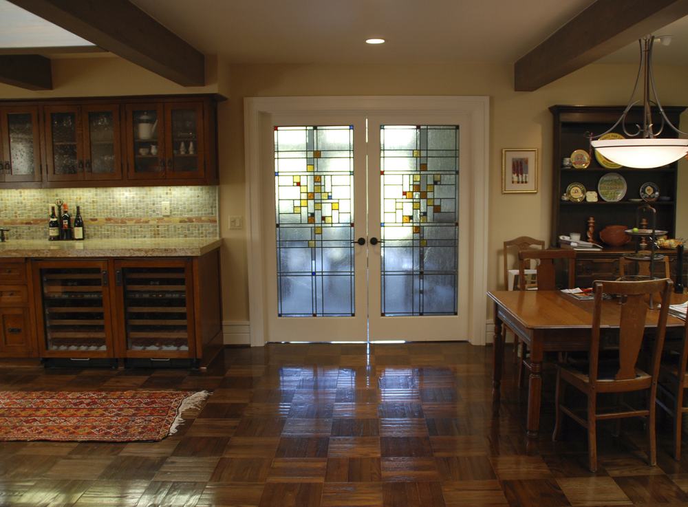Prairie-style geometric stained glass double doors, custom leaded glass